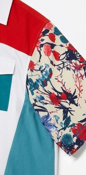 Close-up of floral print sleeve on Fila camp shirt