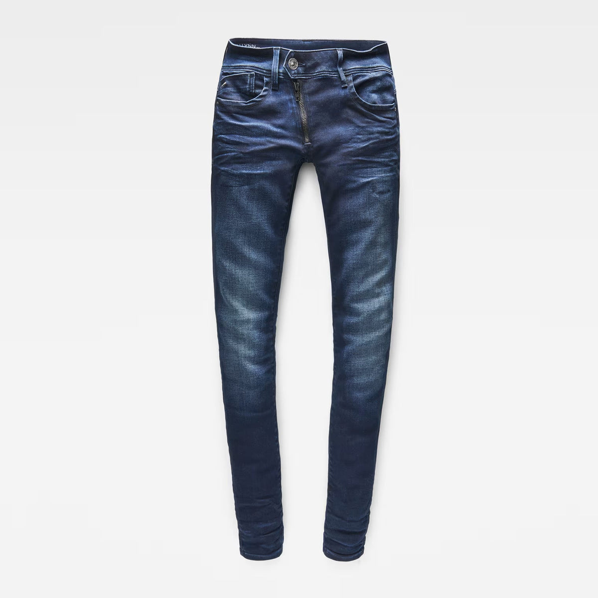 Front view of dark blue skinny jeans with a mid waist and skinny fit on a white background.