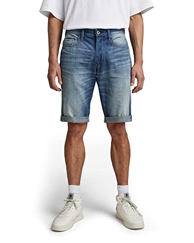 G-Star RAW 3301 denim shorts in faded blue wash on a model