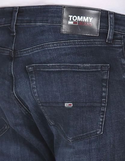 Close-up of Tommy Jeans back pocket and leather waist patch
