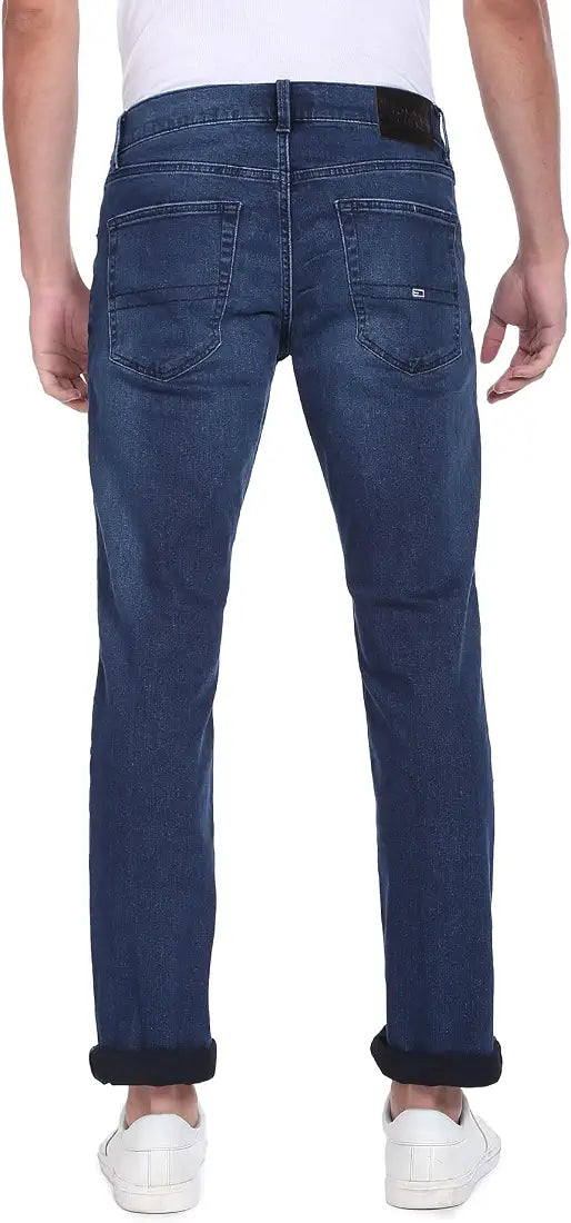 Tommy Jeans faded blue jeans, back view on model