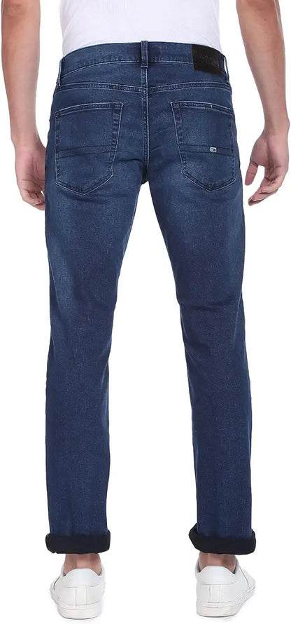 Tommy Jeans faded blue jeans, back view on model