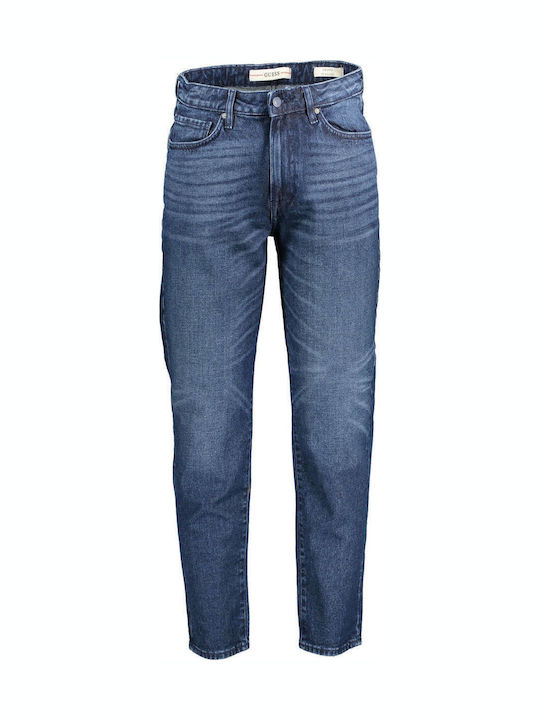 GUESS men's blue denim jeans, flat front view