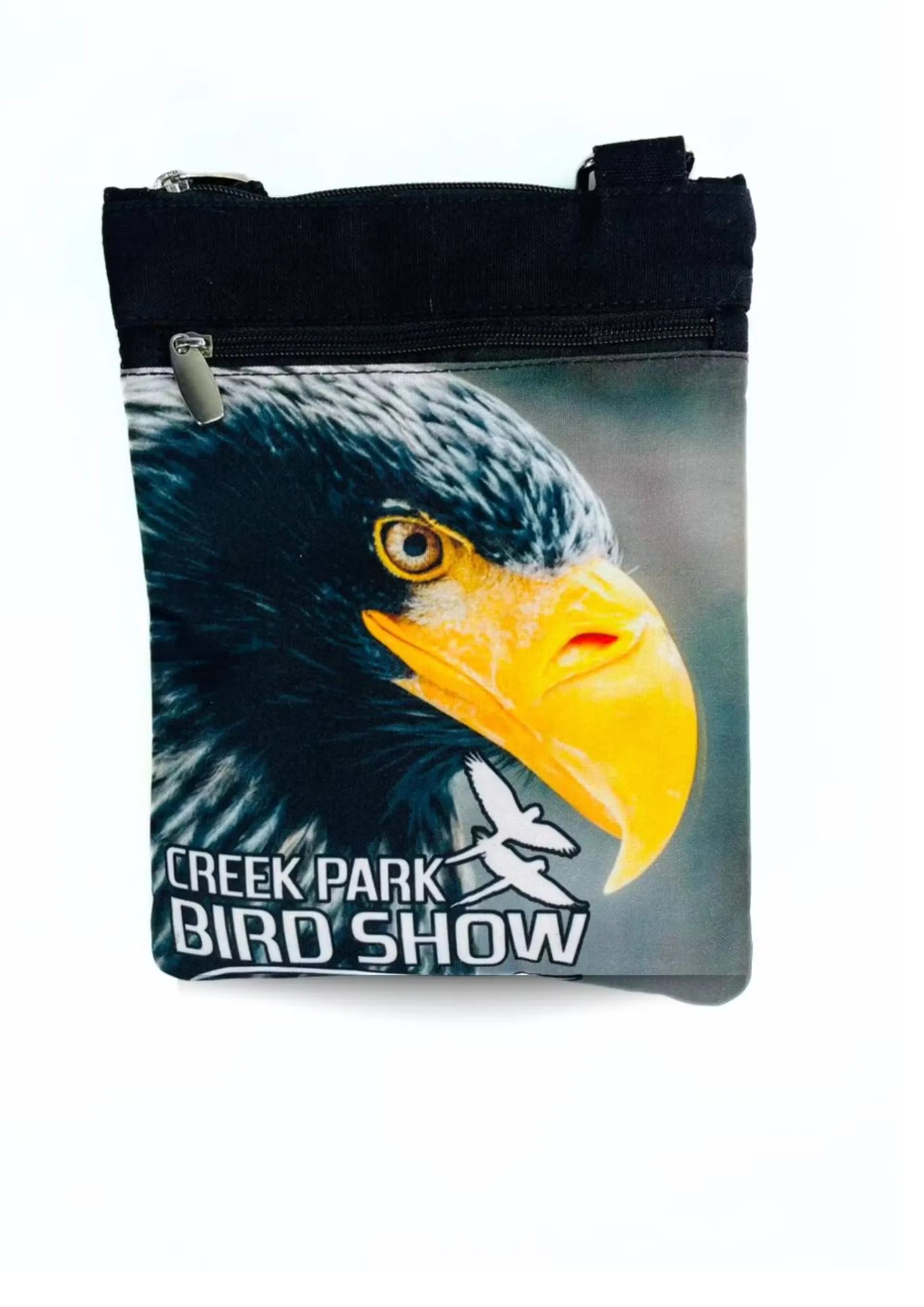 A stylish Creek Park Bird Show side bag with a black exterior and cloths straps. The bag has multiple compartments and pockets for storing essentials.