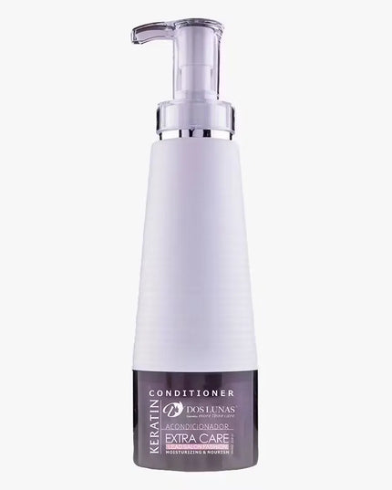 White bottle with blue accents and pump dispenser of Dos Lunas Keratin Extra Care Conditioner (500ml). Close-up view with conditioner being poured onto hand.