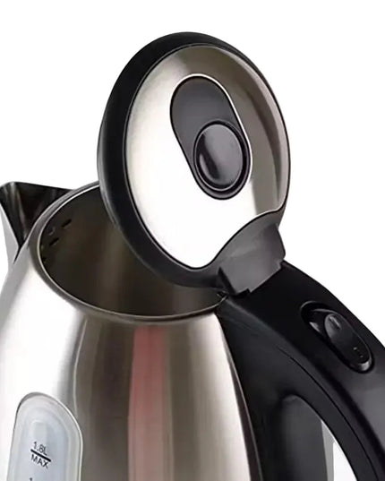 Insiya 1.8L electric kettle pouring water into a mug, highlighting its convenient spout and rapid boiling. Upgrade your kitchen with the stylish Insiya 1.8L electric kettle, featuring fast boiling and a premium design.