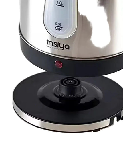Insiya 1.8L electric kettle pouring water into a mug, highlighting its convenient spout and rapid boiling. Upgrade your kitchen with the stylish Insiya 1.8L electric kettle, featuring fast boiling and a premium design.