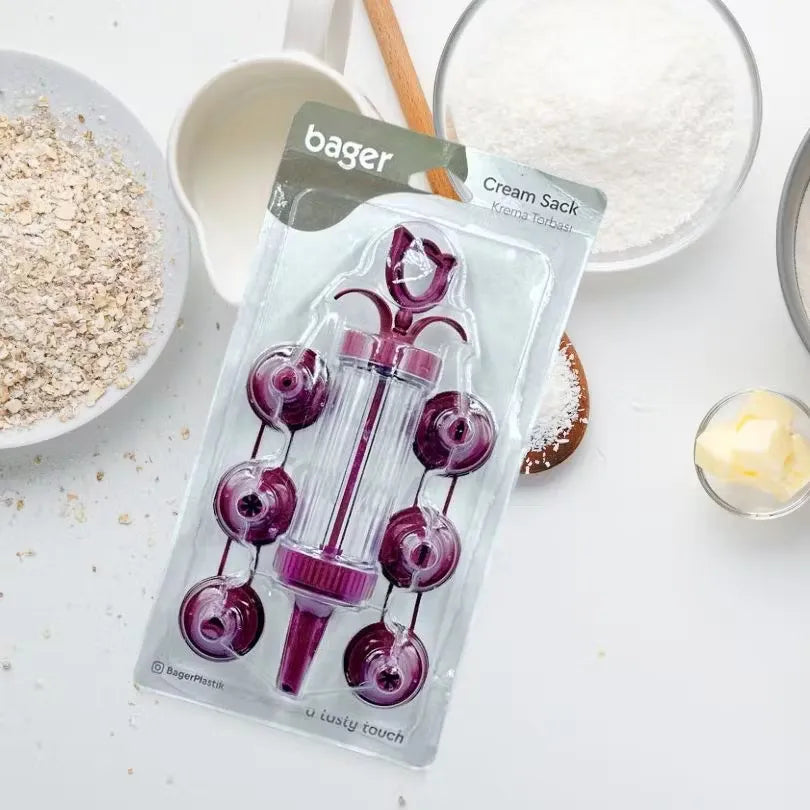 Maroon Bager cream pump & 7 unique molds: Decorate desserts with ease & delight!  Create stunning desserts with this versatile cream decorating kit in a vibrant maroon color.  Pump & 7 diverse molds: Endless possibilities for cakes, pastries, and more! Id