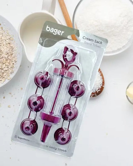 Maroon Bager cream pump & 7 unique molds: Decorate desserts with ease & delight!  Create stunning desserts with this versatile cream decorating kit in a vibrant maroon color.  Pump & 7 diverse molds: Endless possibilities for cakes, pastries, and more! Id