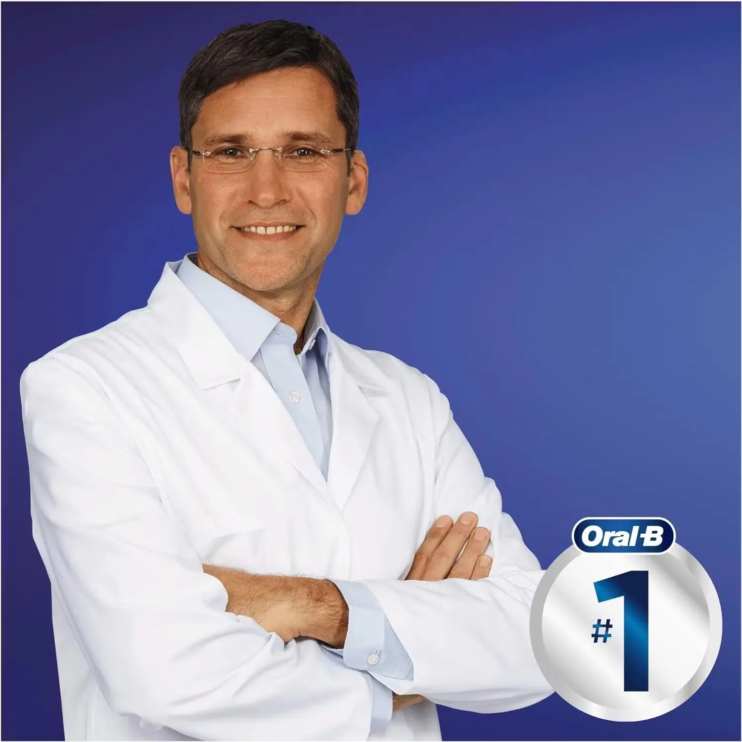 Blue Oral-B Clean, Fresh & Strong toothbrush with medium bristles and a textured tongue cleaner on the back.