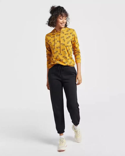 A woman wearing a hooded sweatshirt with a full-body print of The Lion King characters. Cozy up in style with the Max Lion King all-over print women's sweatshirt! Featuring a playful design and comfortable hoodie, this sweatshirt is perfect for casual wear. Shop now on Dubailisit!