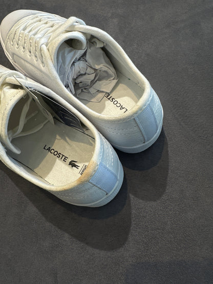 Lacoste white leather sneakers showing branded insoles