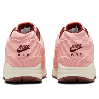 Nike Air Max 1 coral sneakers, back heel view