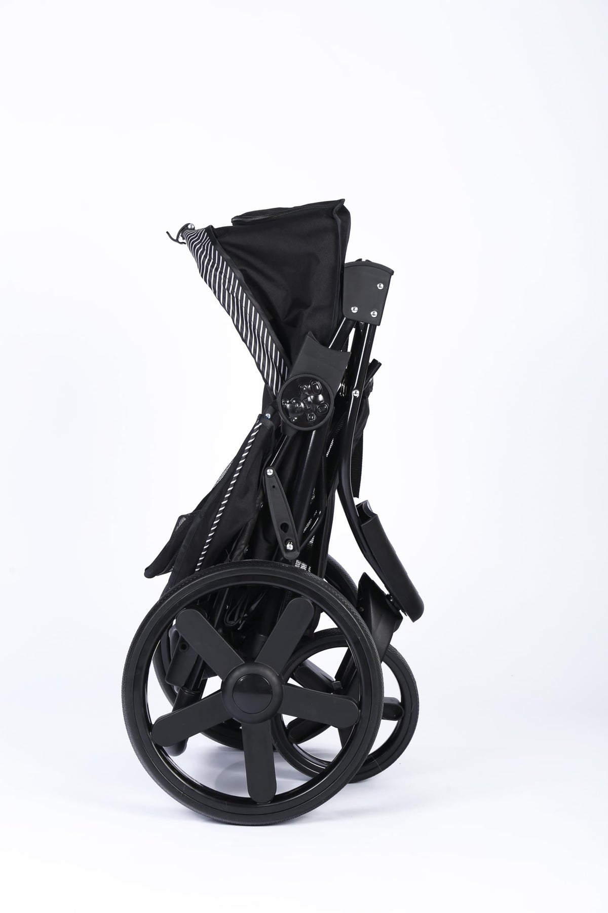 M-Pets Aventura black dog stroller folded flat, side view