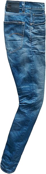 Side view of blue jeans with a faded design and slim fit on a white background.