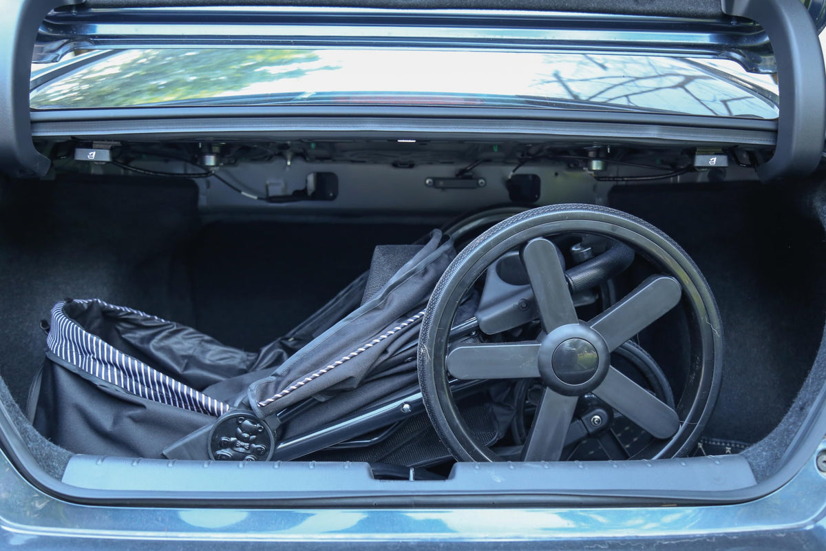 M-Pets Aventura stroller folded inside a car boot