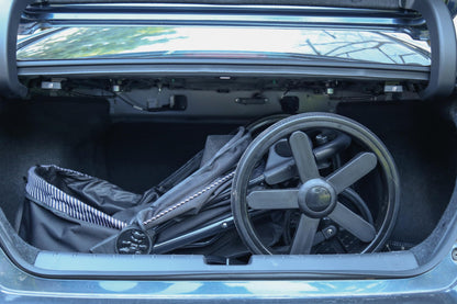M-Pets Aventura stroller folded inside a car boot