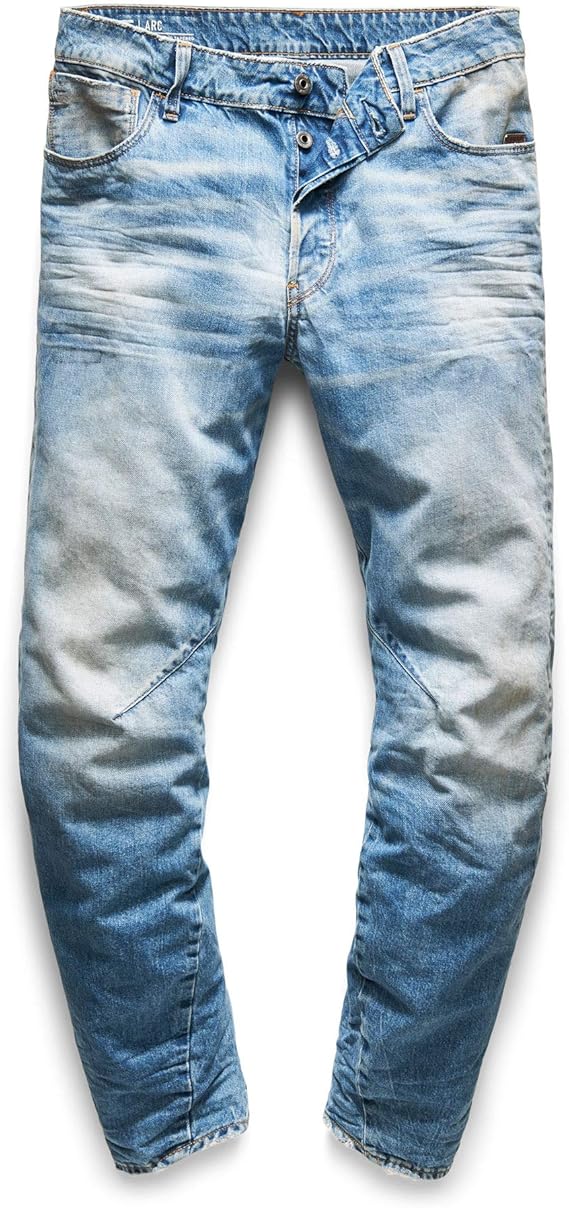 Detail close-up of light blue jeans highlighting the distressed look and skinny fit on a white background.