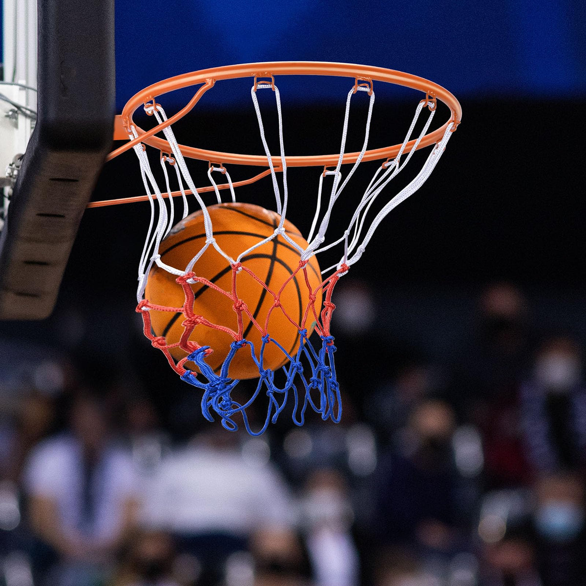 Basketball dropping through VEVOR orange rim and net