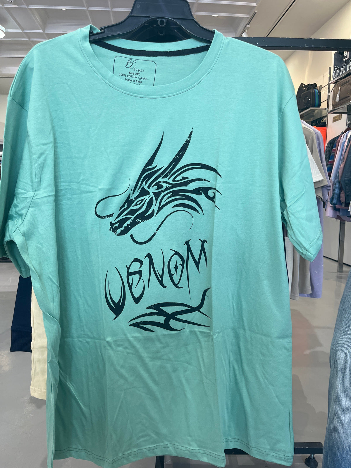 BS Style mint green Venom dragon t-shirt, front view on hanger
