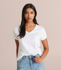 G-Star women's white V-neck t-shirt worn with denim shorts, front view on model