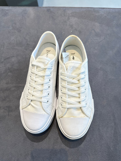 Lacoste white leather low-top sneakers, top view pair