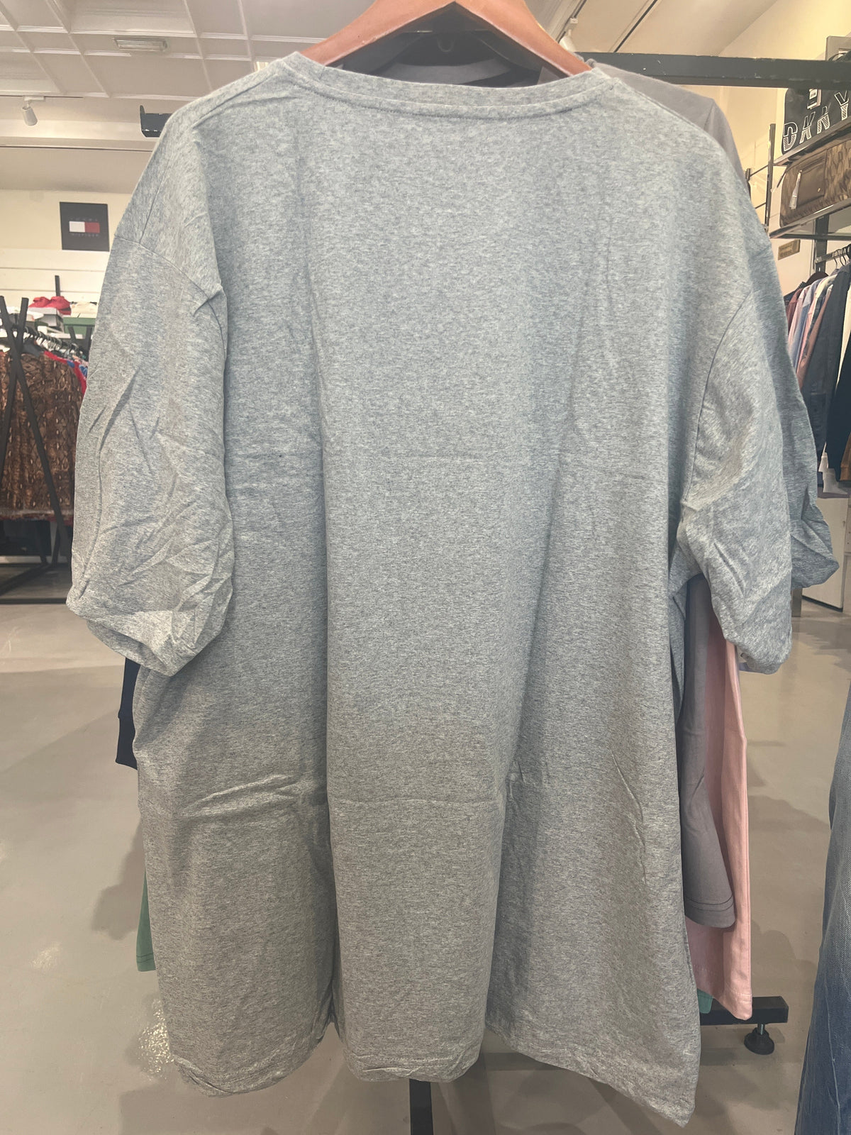 BS Style heather grey oversized t-shirt, back view on hanger