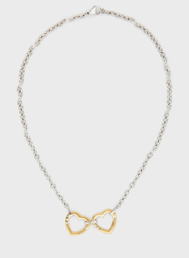 Guess silver chain necklace with gold double heart pendant, full view
