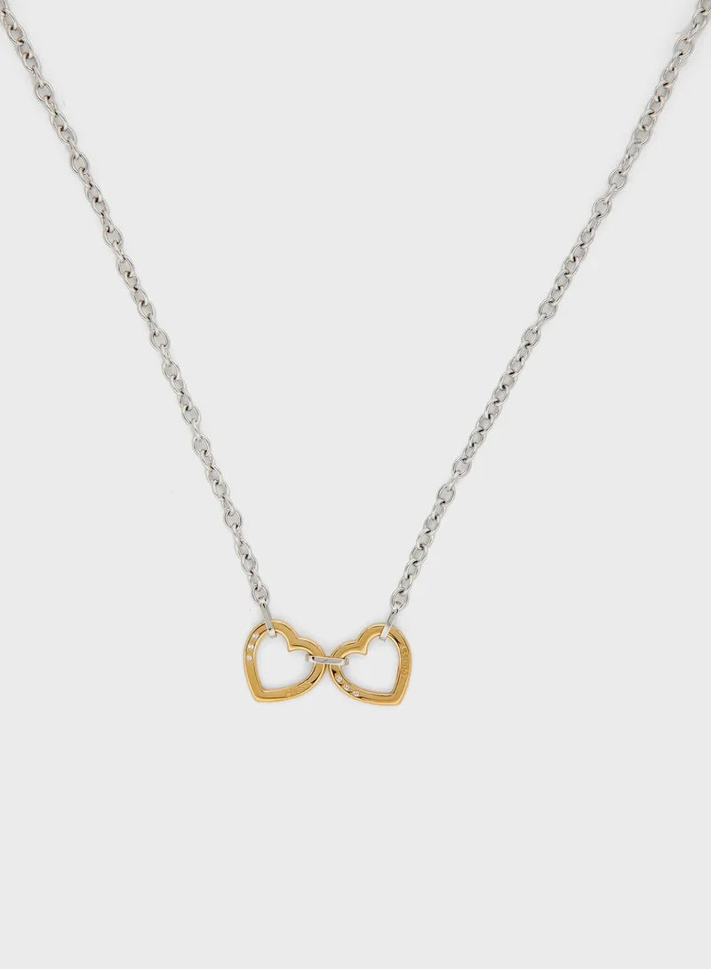 Guess two hearts necklace in silver and gold, hanging front view