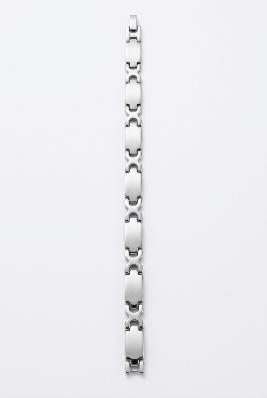 All-silver chain bracelet on a white studio background