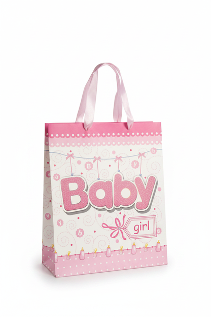 Baby girl pink and white gift bag with ribbon handles, angled view