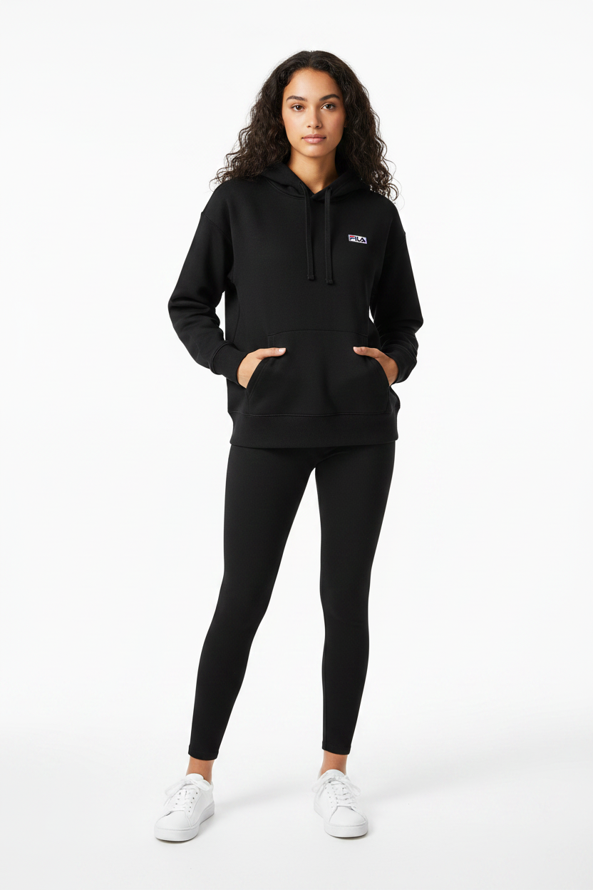 Woman wearing Fila Marina black hoodie with leggings