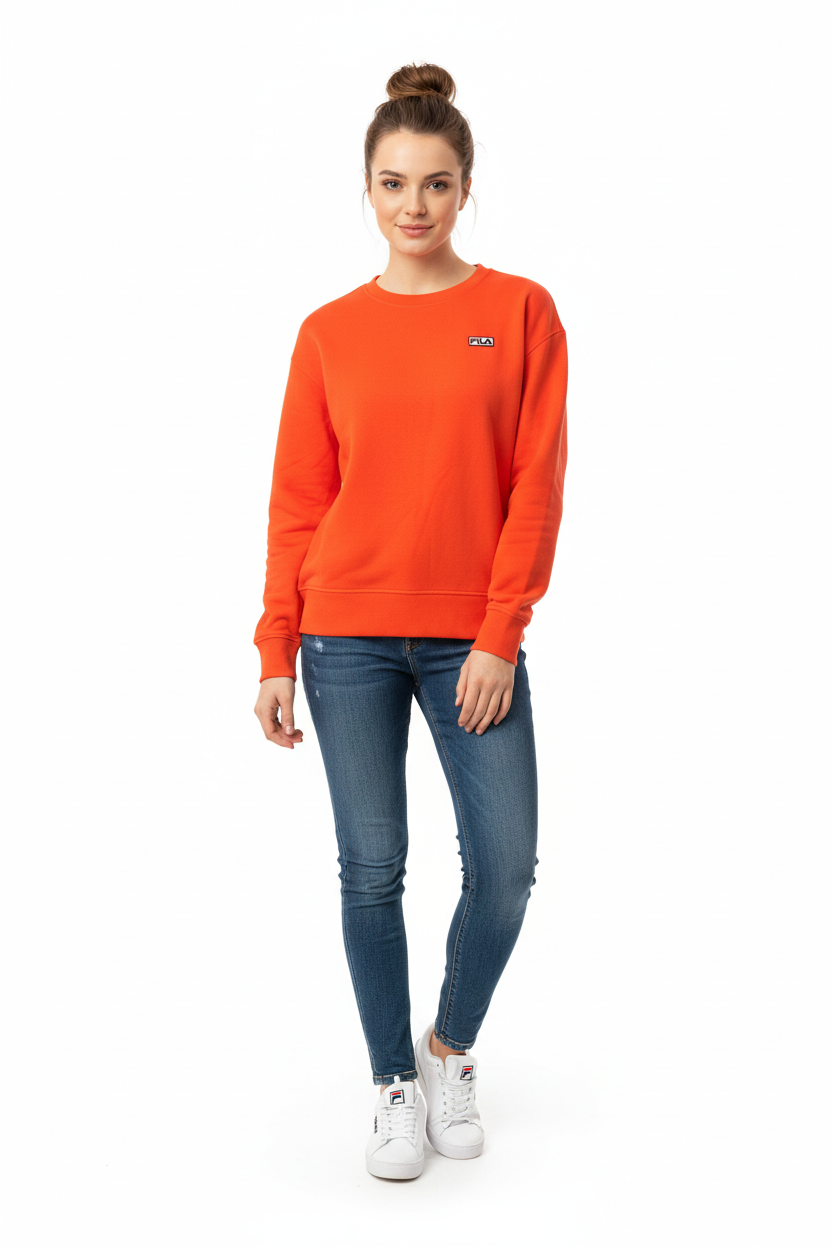 Woman wearing Fila orange sweatshirt with jeans