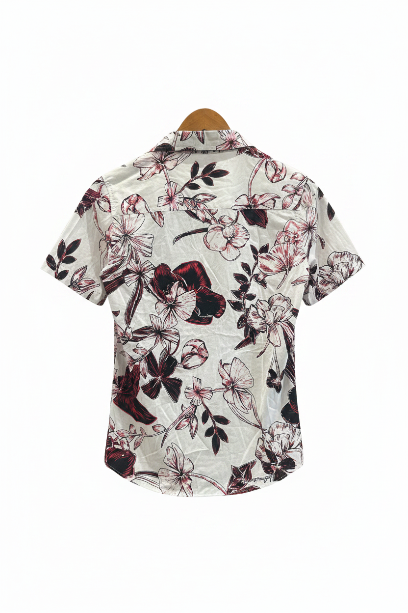 Back view of MNG floral print shirt on hanger