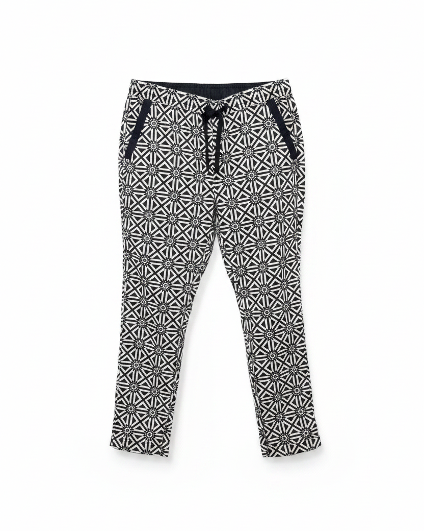 Front view of G-Star Raw geometric print pants featuring an elastic waistband and pockets.