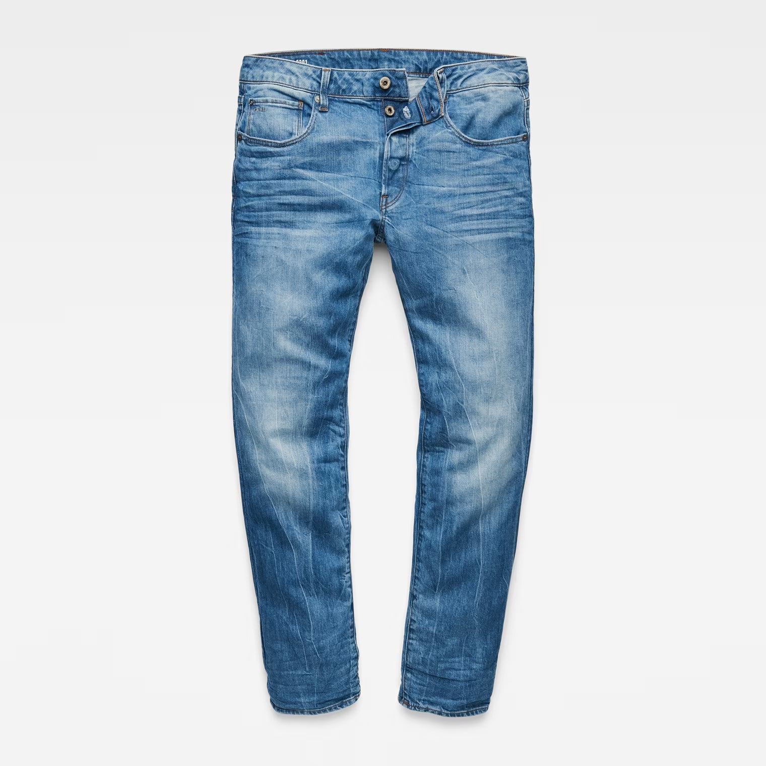 Front view of medium blue straight fit jeans featuring a zipper fly and five pockets on a white background.