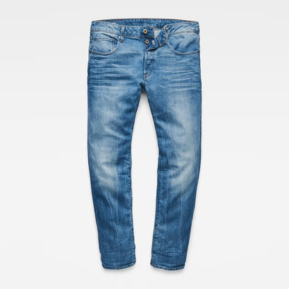Front view of medium blue straight fit jeans featuring a zipper fly and five pockets on a white background.