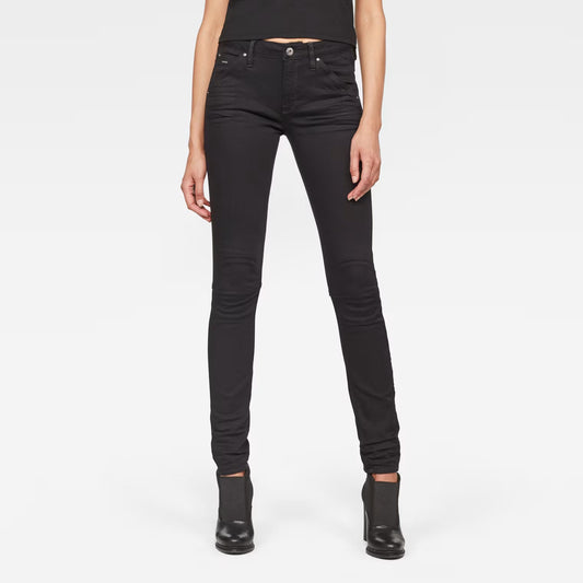 Front view of black skinny jeans with mid waist and skinny fit on a white background