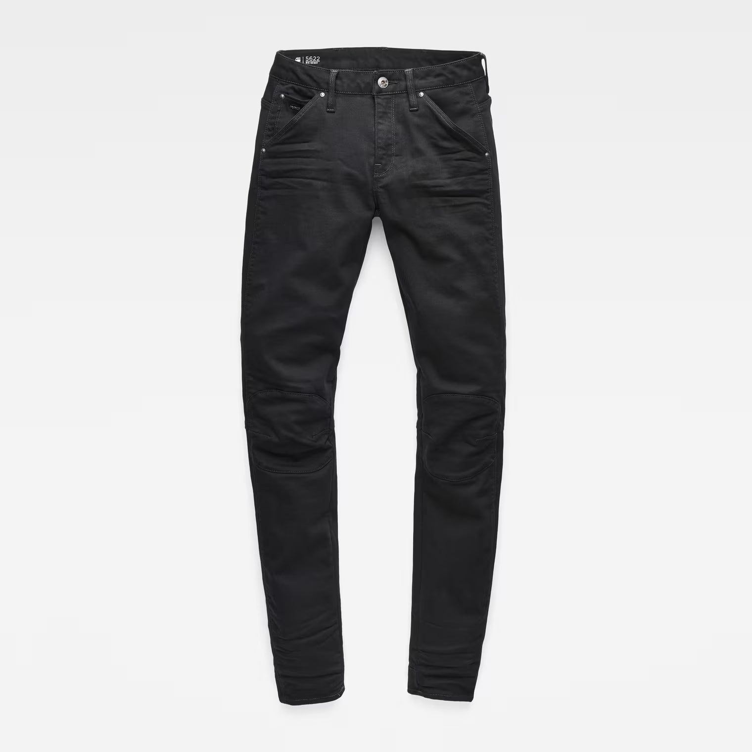 Packaging view of black skinny jeans with mid waist and skinny fit on a white background
