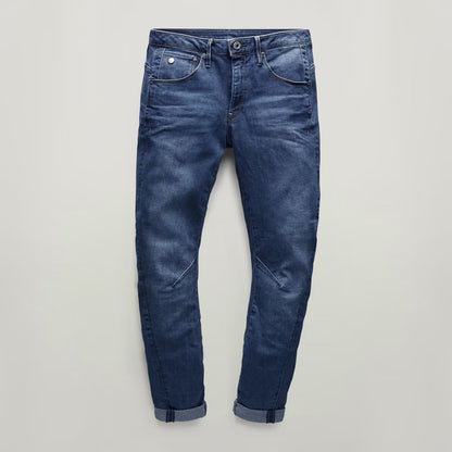 Other angle view of dark blue boyfriend jeans highlighting the distressed look from the front.