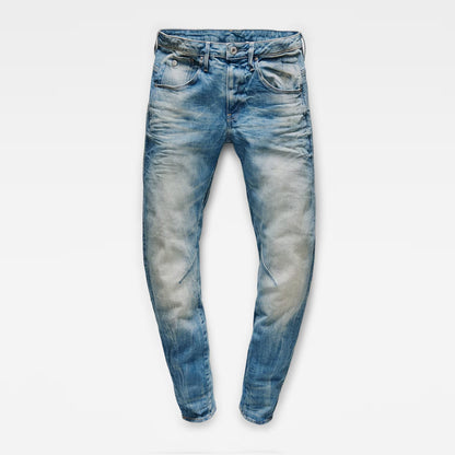 Front view of medium blue boyfriend jeans with a skinny fit and distressed look on a transparent background.