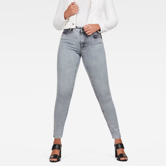Front view of light blue skinny jeans featuring a high waist and super skinny fit.