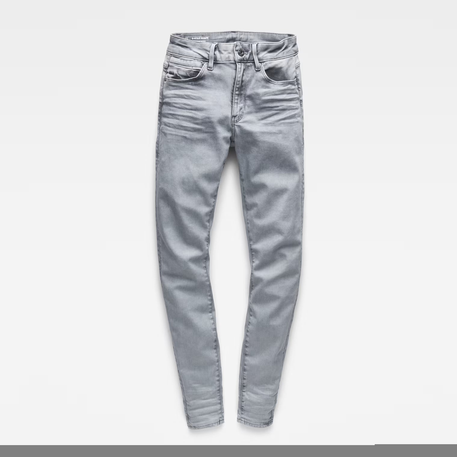 Packaging view of light blue skinny jeans with a high waist and super skinny fit.