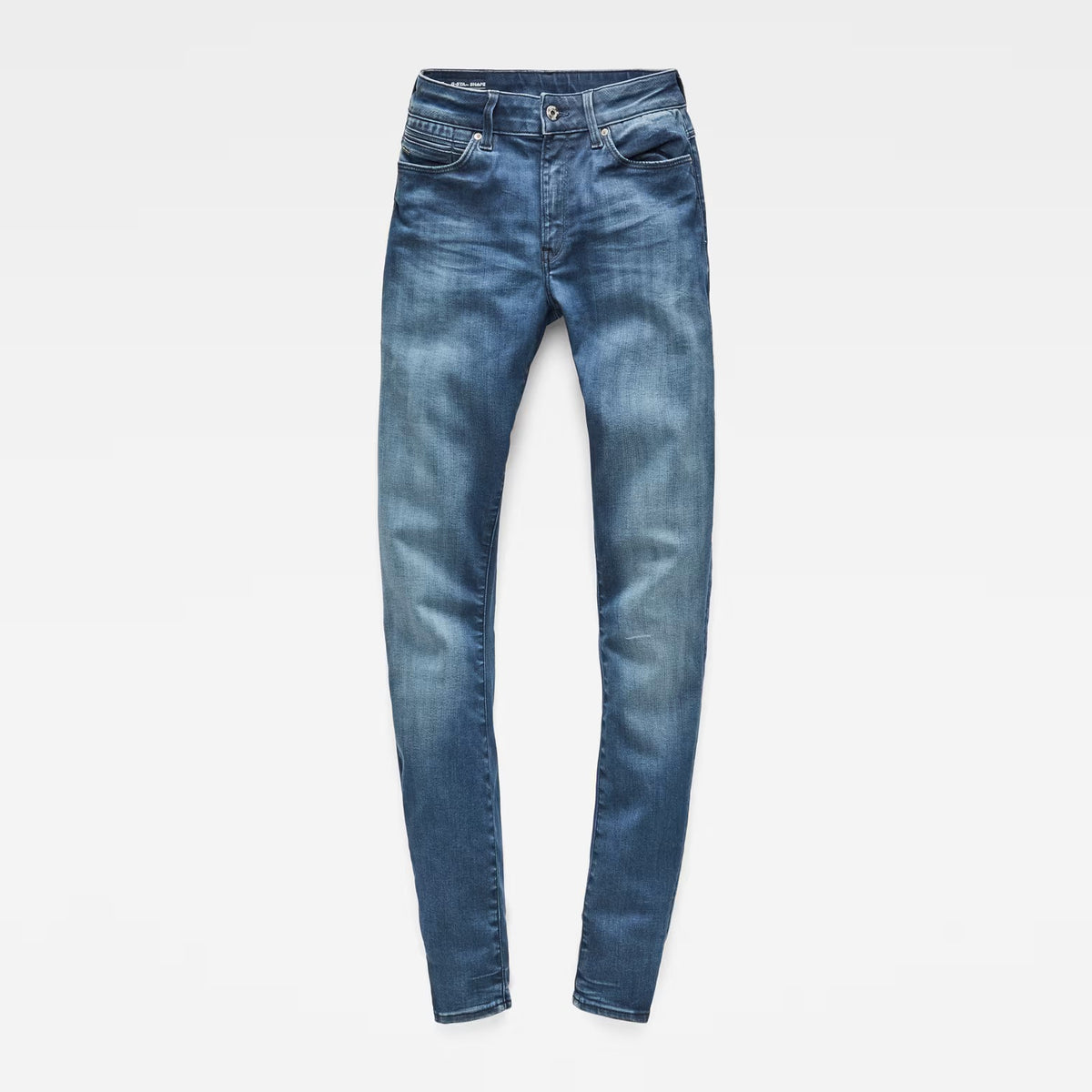 Front view of medium blue skinny jeans with a fitted design and high waist.
