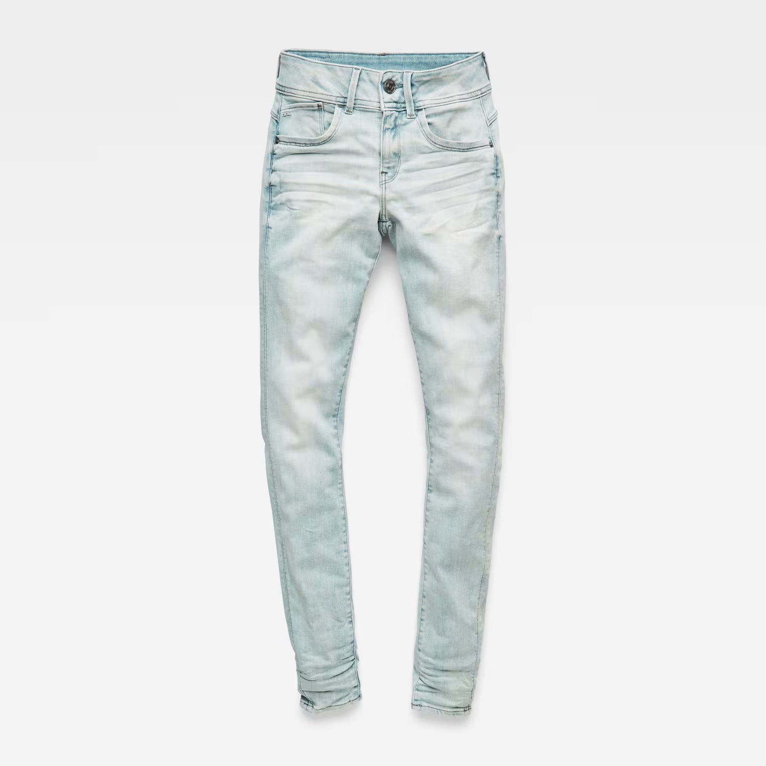 Front view of light blue skinny jeans showcasing a mid waist and skinny fit on a white background.