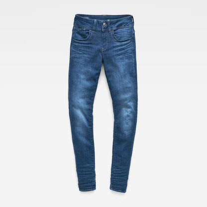 Front view of blue skinny jeans with mid waist on a white background