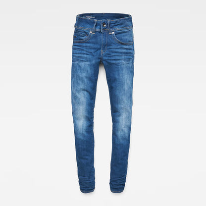 Other angle of medium blue jeans displaying mid waist and straight fit on a white background.