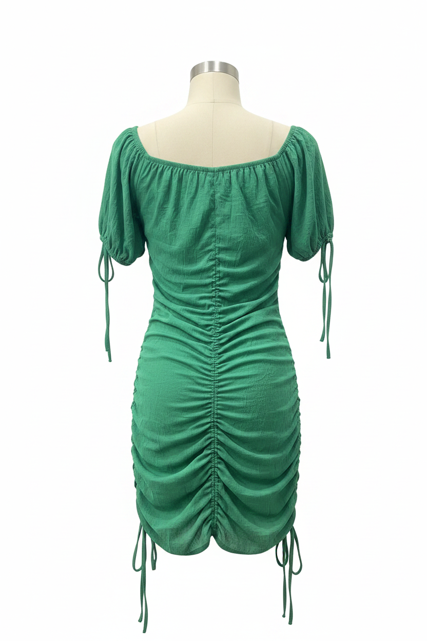 Back view of green ruched Diyana Secret dress with drawstring ties on mannequin
