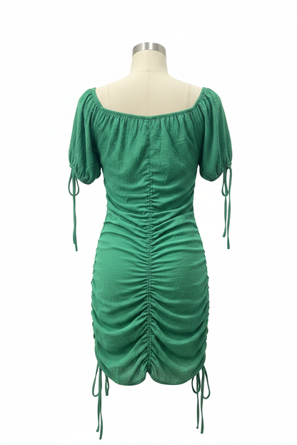 Back view of green ruched Diyana Secret dress with drawstring ties on mannequin