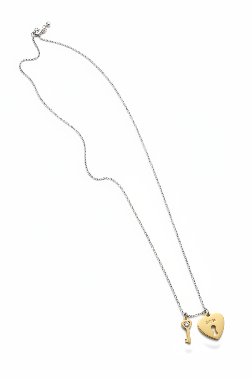 Guess silver chain necklace with gold heart lock and key pendants, full view